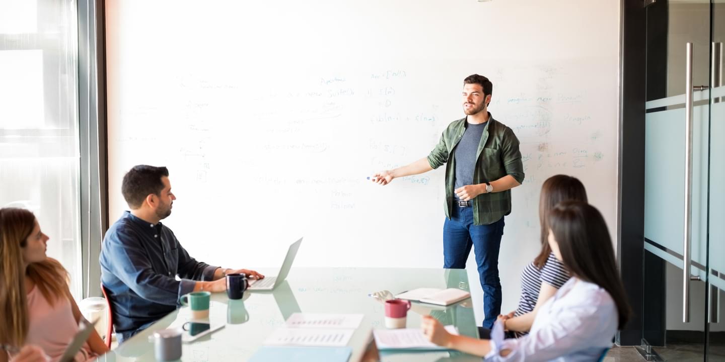 Businessman discussing future plans with his colleagues