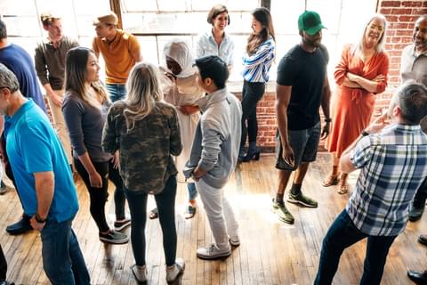 Diversity large group of people talking in small groups